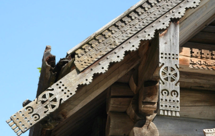 Колесо Юпитера в украшении крыши дома